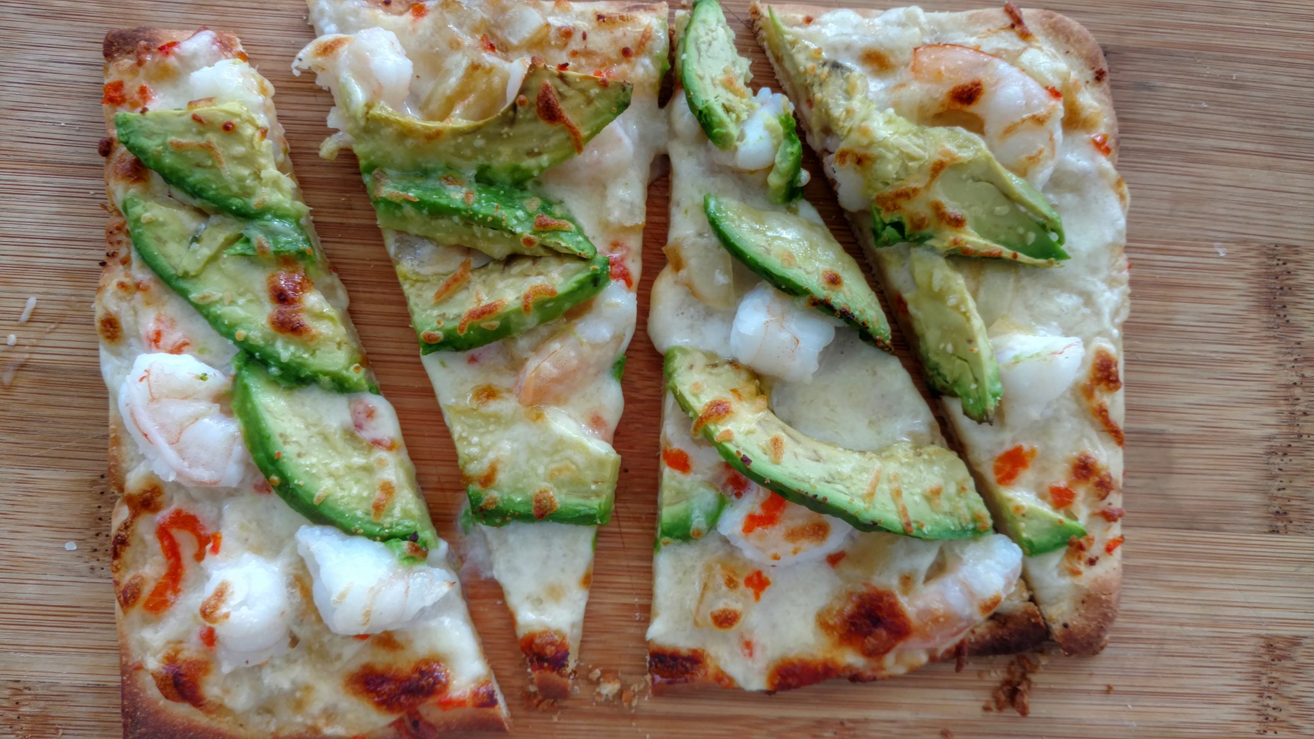 California Avocado and Shrimp Flatbread with smoked onion, candied