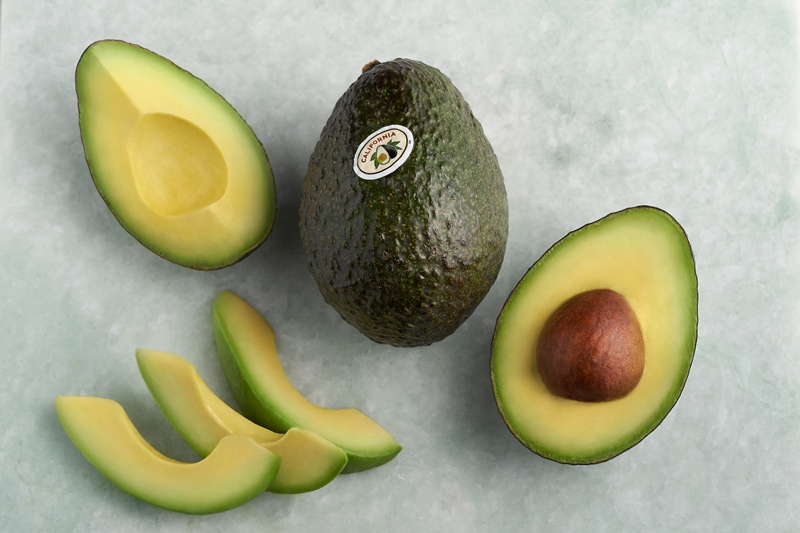Avocados presented as whole, halved, quartered, and sliced