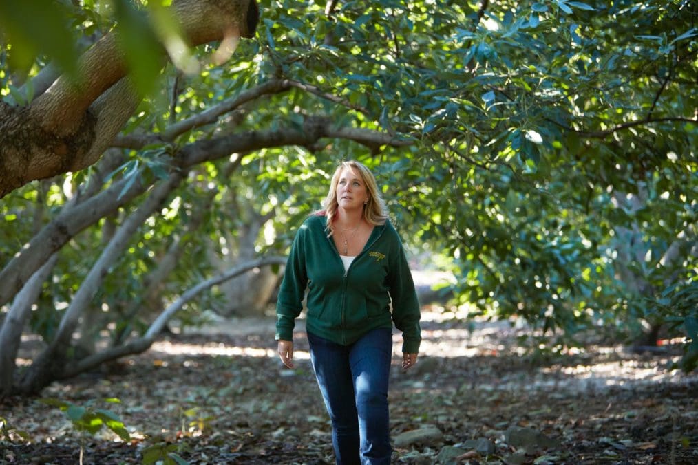 California avocado grower Rachael Laenen in an avocado grove
