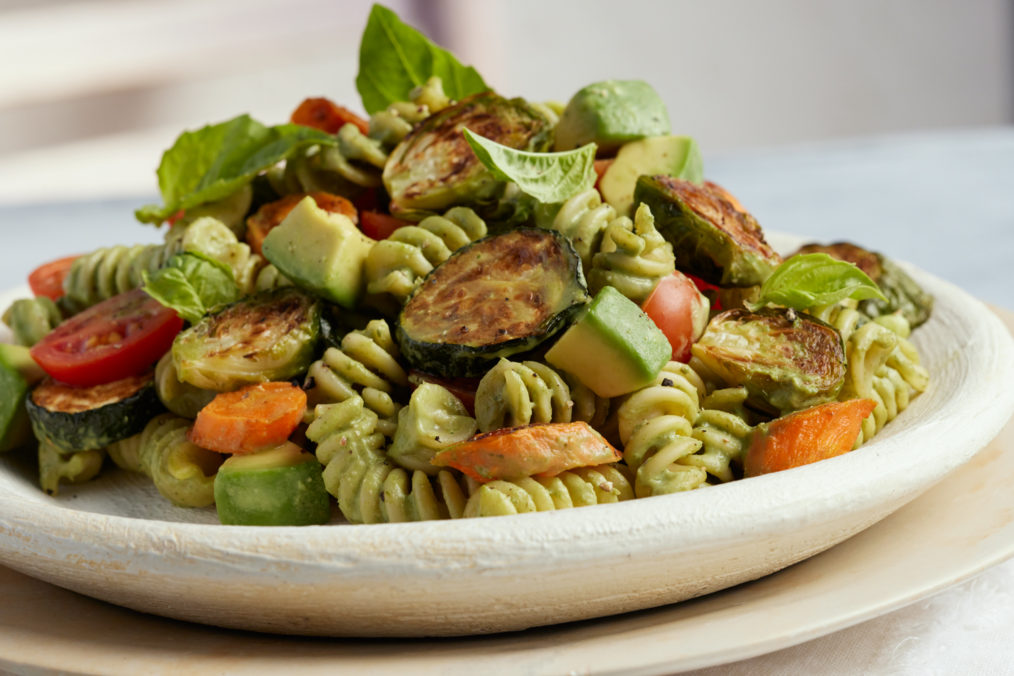 Bowl of pasta made with avocado pesto sauce
