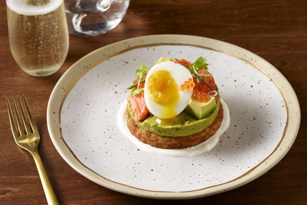 A photo of a Smoked Salmon California Avocado Hummus and Potato Rosti