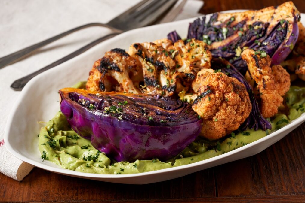 A photo of Chili Grilled Cauliflower and Cabbage with Avocado Spread