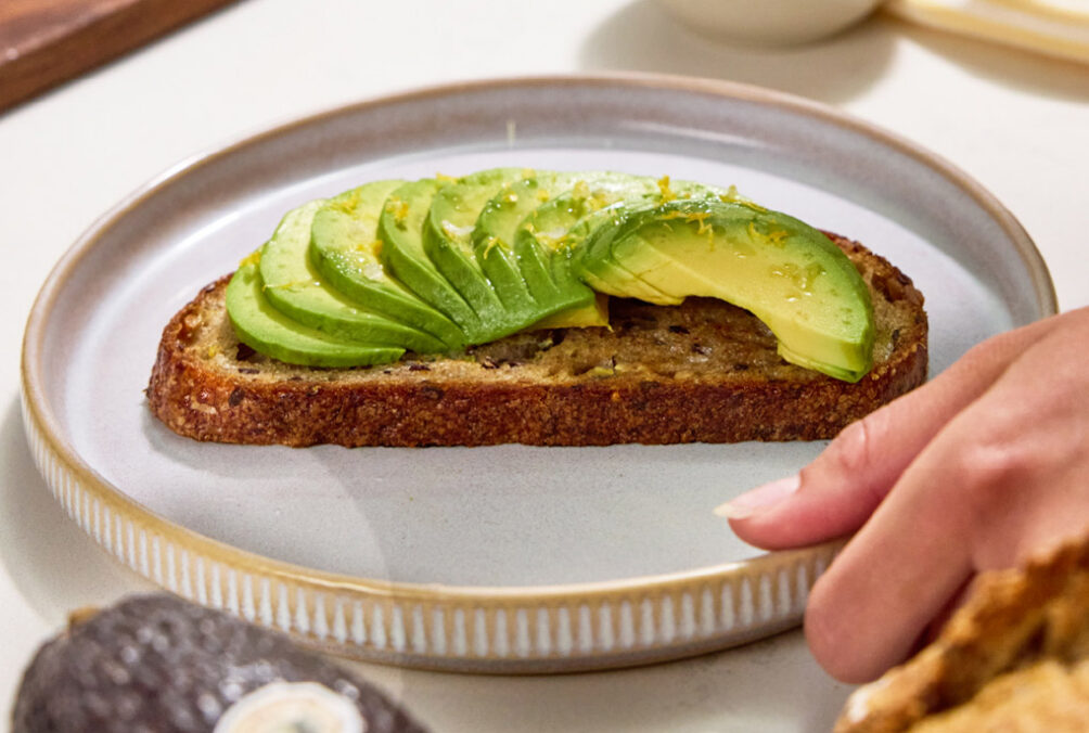 California avocado toast with a squeeze of lemon juice, lemon zest and flaky sea salt.
