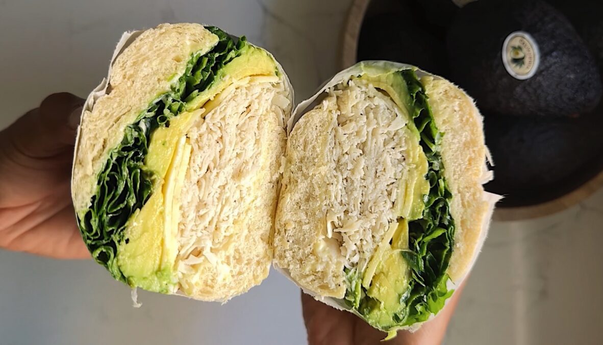A photo of a turkey avocado sandwich with yuzu mayonnaise