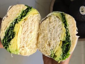A photo of a turkey avocado sandwich with yuzu mayonnaise